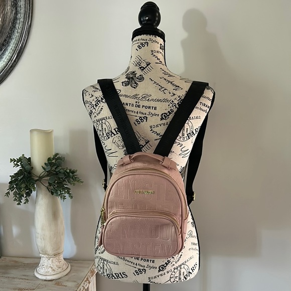 Steve Madden Handbags - Steve Madden Pink Embossed Mini Backpack
